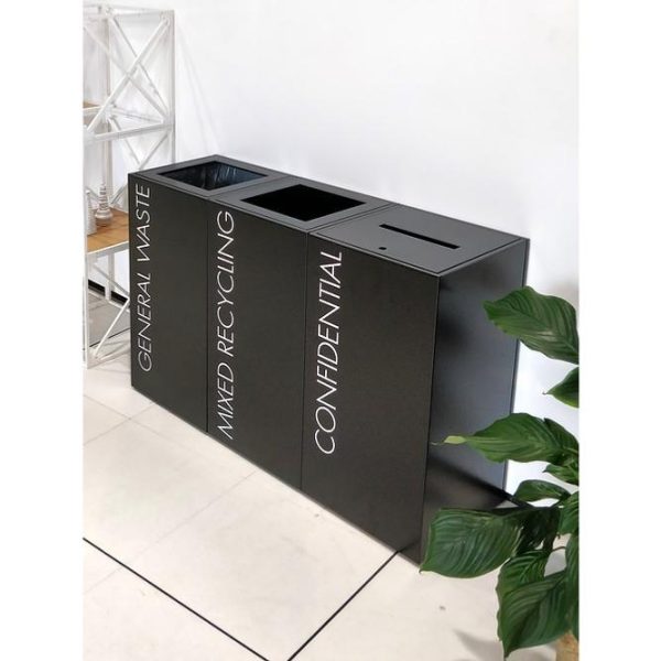 3 black office recycling bins with white lettering