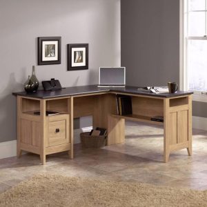 L shaped oak desk in home office setting