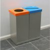 silver office recycling bins with orange top with round cut out and blue top with slot cut out