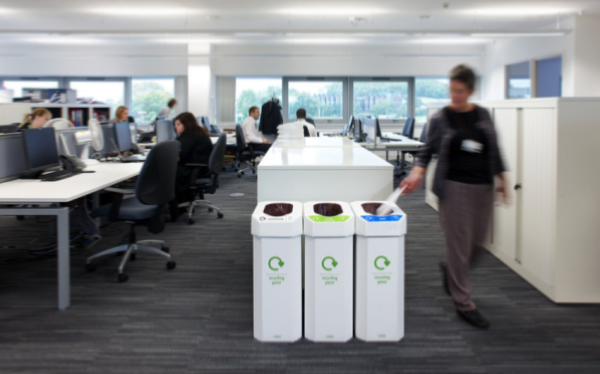 office roomset with 3 cardboard office recycling bins at end of office storage