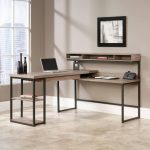 home office l shaped desk in oak with black frame in home office roomset