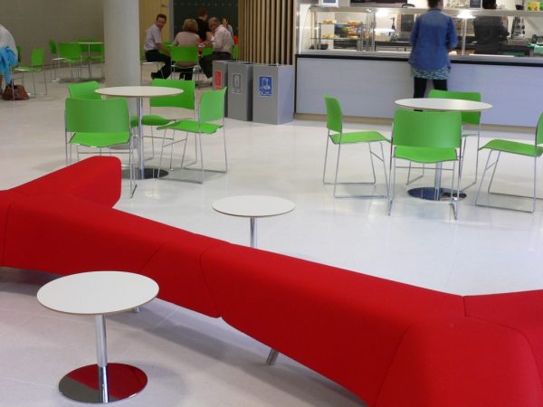 cafe area with 3 silver office recycling bins