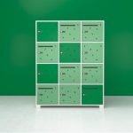 lockable personal storage in green finish with 12 lockers