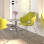 sliegh frame reception chair with chrome frame and yellow fabric seat in reception