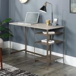 oak Home office desk with oak desk top and metal finish frame. lap top light and photo on top