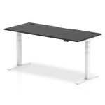 flexible workstations. height adjustable desk with black top and white frame