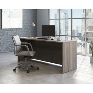 Office desk with panel end and city view out of office window