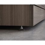Close up of end of office drawer unit in dark wood