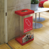 transparent office recycling bin with red top, base and plastic bottles sticker