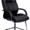 black leather executive meeting chair with padded arms and chrome frame