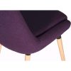 close up of reception chair in purple fabric with wooden legs