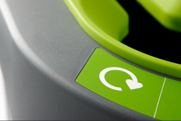 close up of bin with green recycling logo