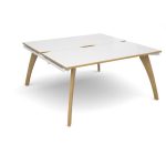 back to back bench desks with white desk top and light wood legs
