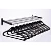 wall mounted coat rack in silver finish with black captive hangers