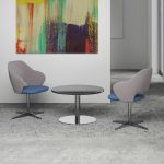 contemporary lounge chairs in reception setting in grey and blue fabric